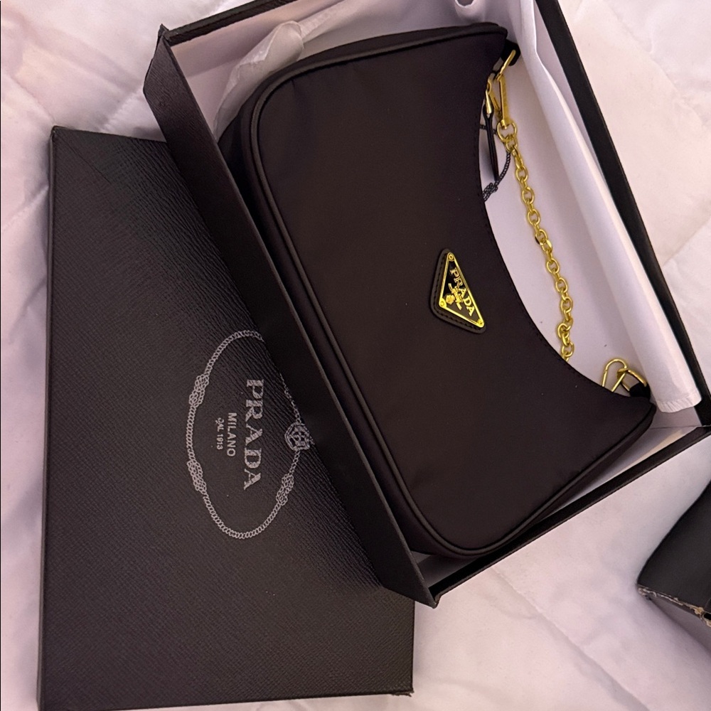 Prada Black Bag with Gold Chain Detail